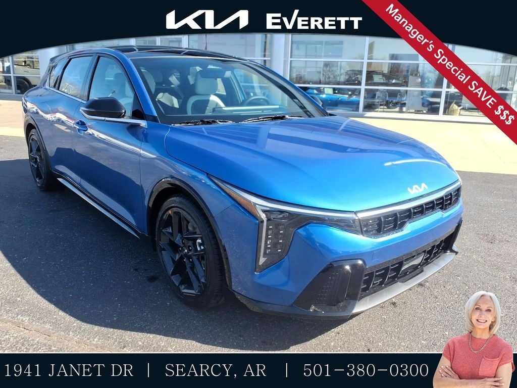 2026 Kia K4 GT-Line Turbo in Wave Blue — front three-quarter view
