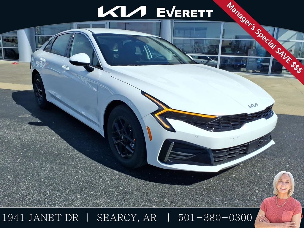 2026 Kia K5 LXS in Snow White Pearl — front three-quarter view